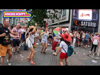 lesbian and gay people in koln (cologne) partying at street during the parade